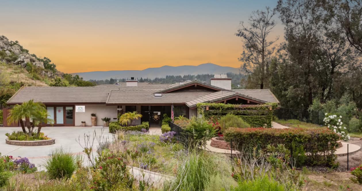 Front of Memory Care building with views of sunset